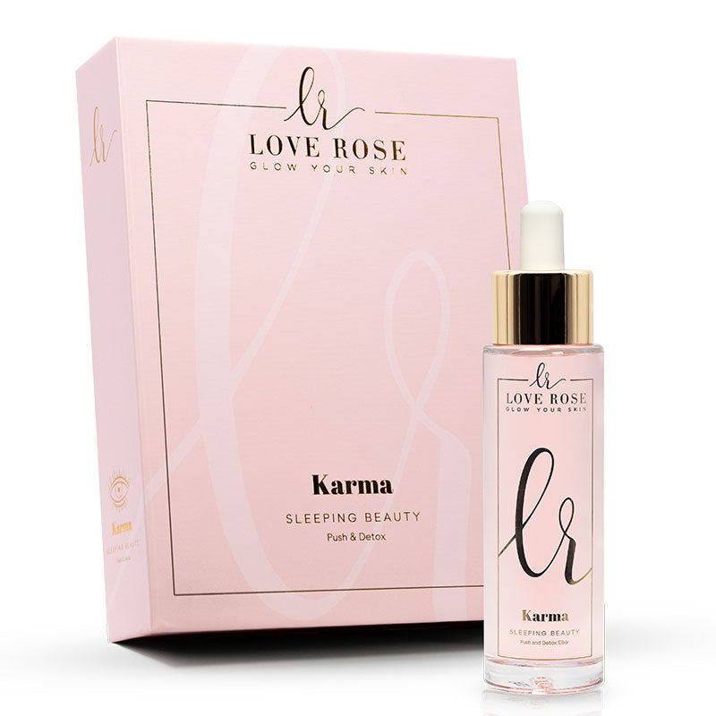 Karma Elixier Gesichtsöl von Love Rose mit rosa Geschenkverpackung und Pipettenflasche